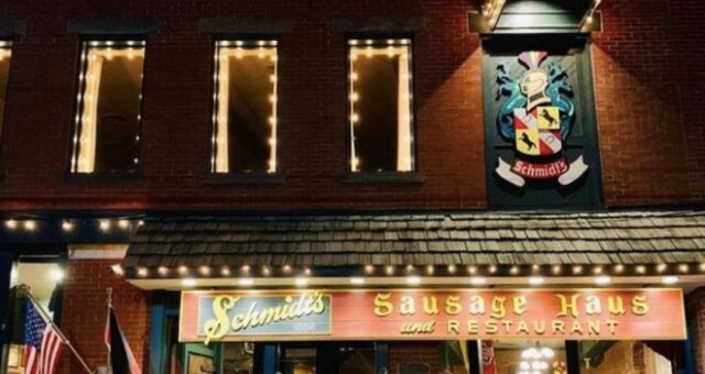 A night time image of a restaurant, seen from outside